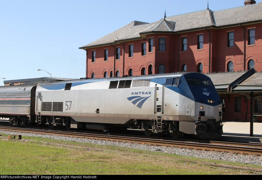 AMTK 57 brings train 80 into the station